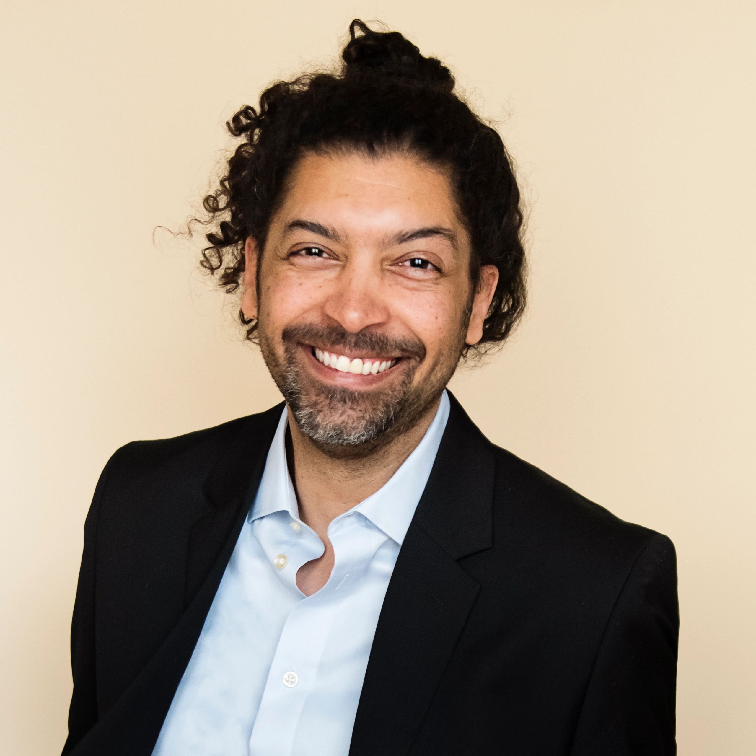 Professional headshot representing a cloud director